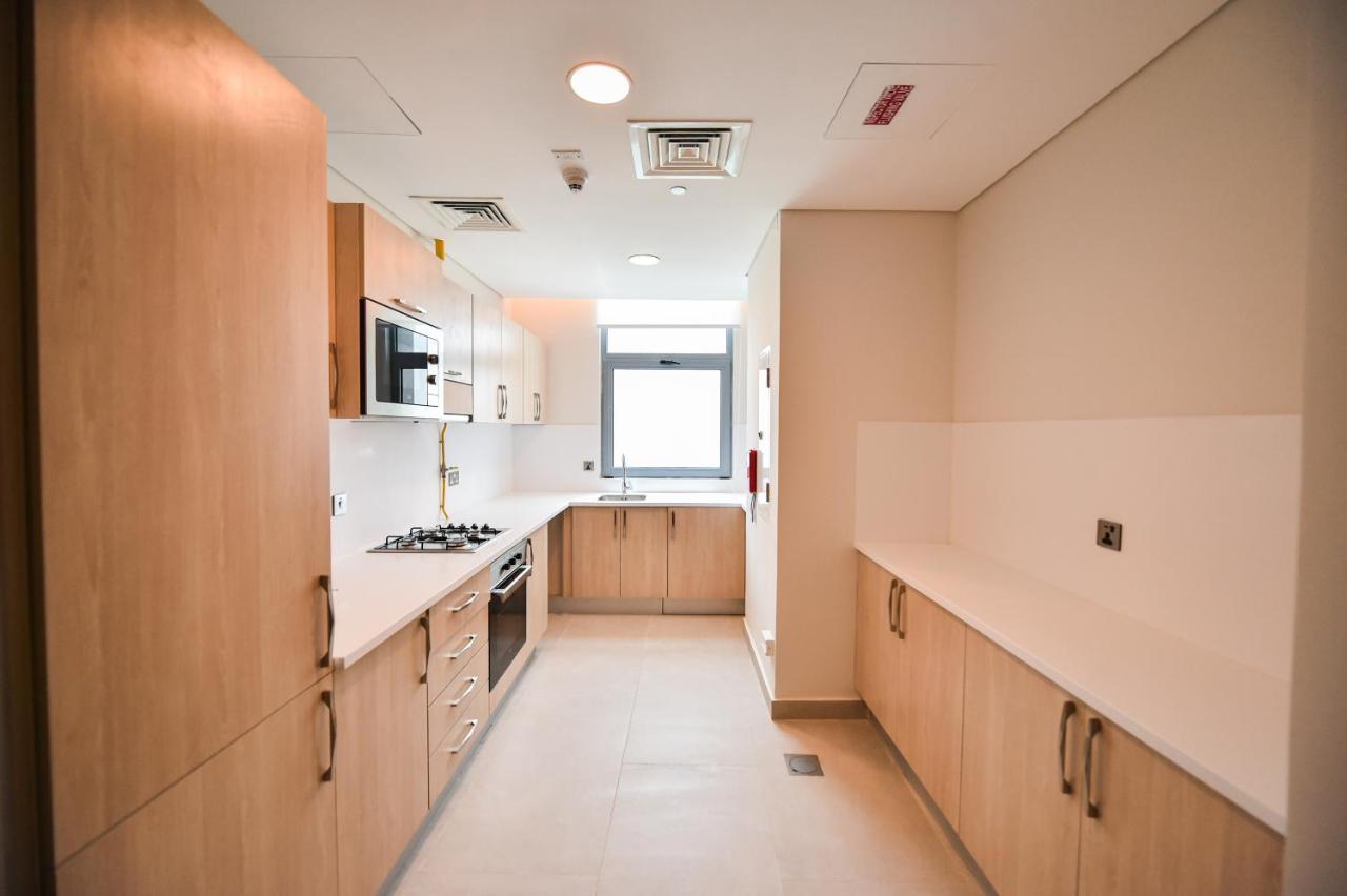 Waterfront Hotel Apartment Lusail المظهر الخارجي الصورة A typical kitchen in a student flat