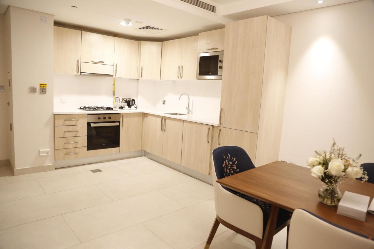 Waterfront Hotel Apartment Lusail المظهر الخارجي الصورة A kitchen in a serviced apartment in London